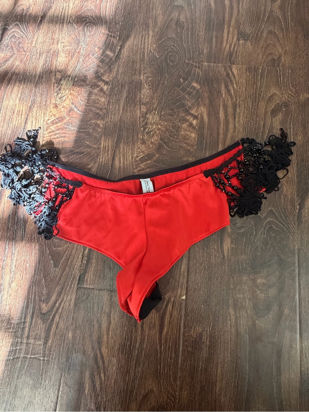 Chantal Thomass for Victoria’s Secret.  Bottoms size m. Red satin with beading